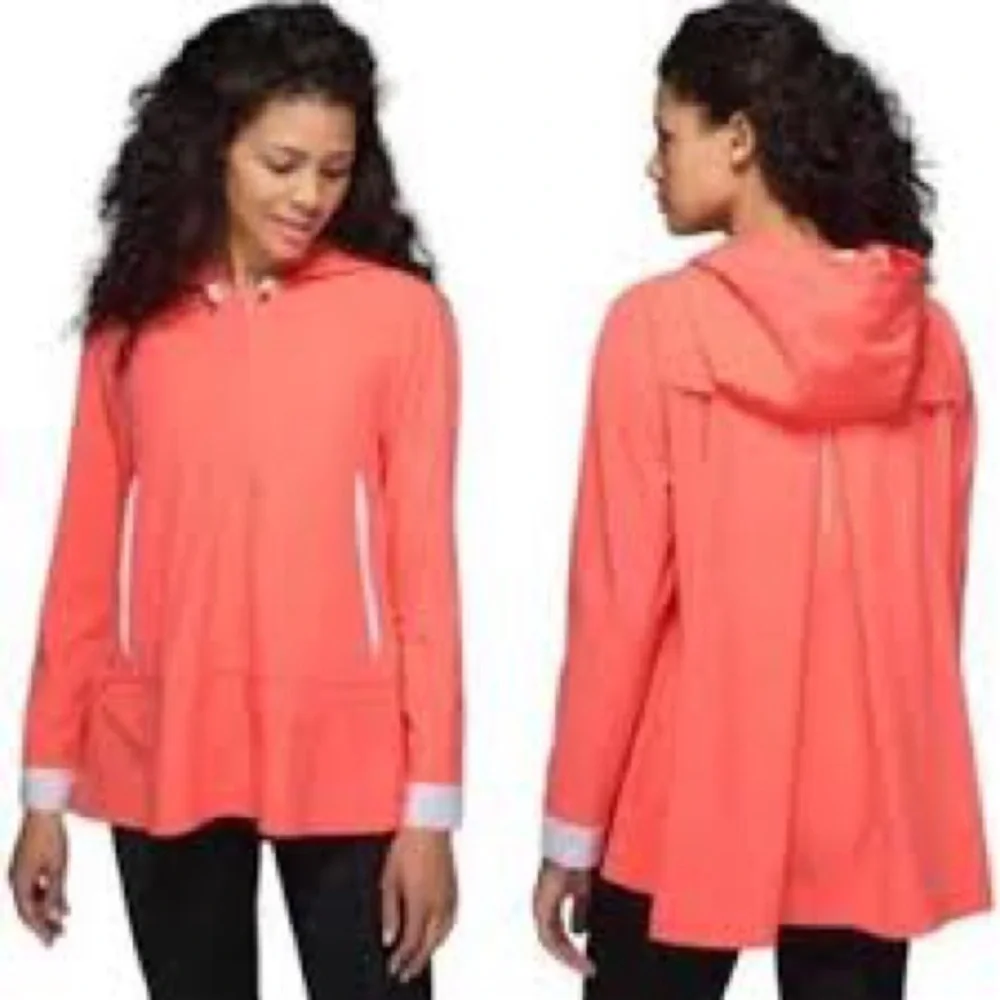 Lululemon Sun Showers Jacket in the grapefruit white